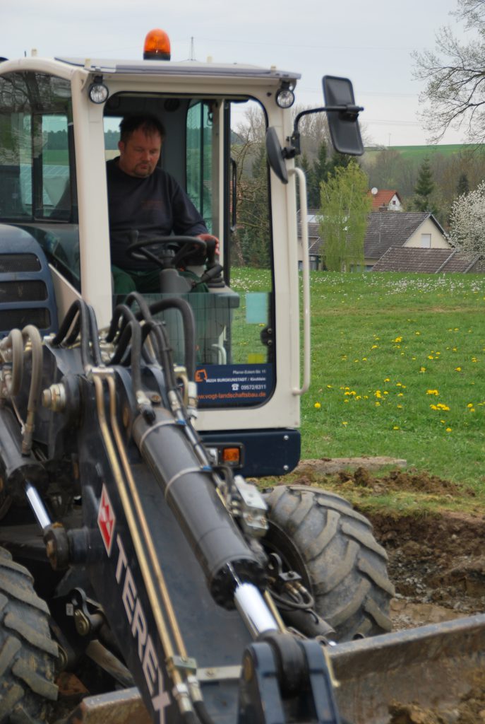 Historische Arbeitsszene im Radlader